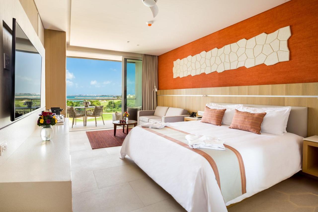 Chambre Lit King-Size Deluxe - Vue sur Golf et Océan