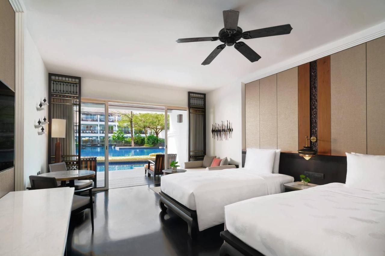 Deluxe Twin Room One Twin Bed Sofa Bed Pool Access