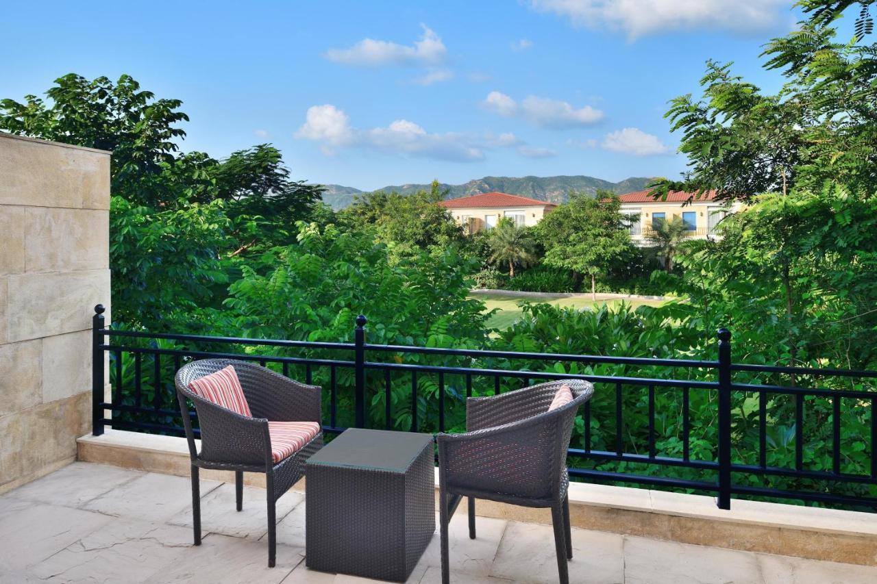 Twin Bedded Grand Villa with Balcony and Resort View - Watch 1 Complimentary movie at the in house theater, Early Check-in by 12:00Hrs and Late Check-out by 13:00Hrs (Subject to Availability)