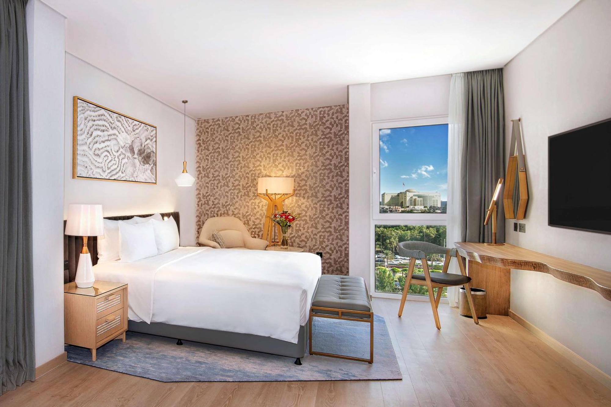 Suite Premium con vistas al mar, acceso al salón y acceso gratuito a la piscina de surf, al parque de aventuras, a la piscina de olas y al río lento