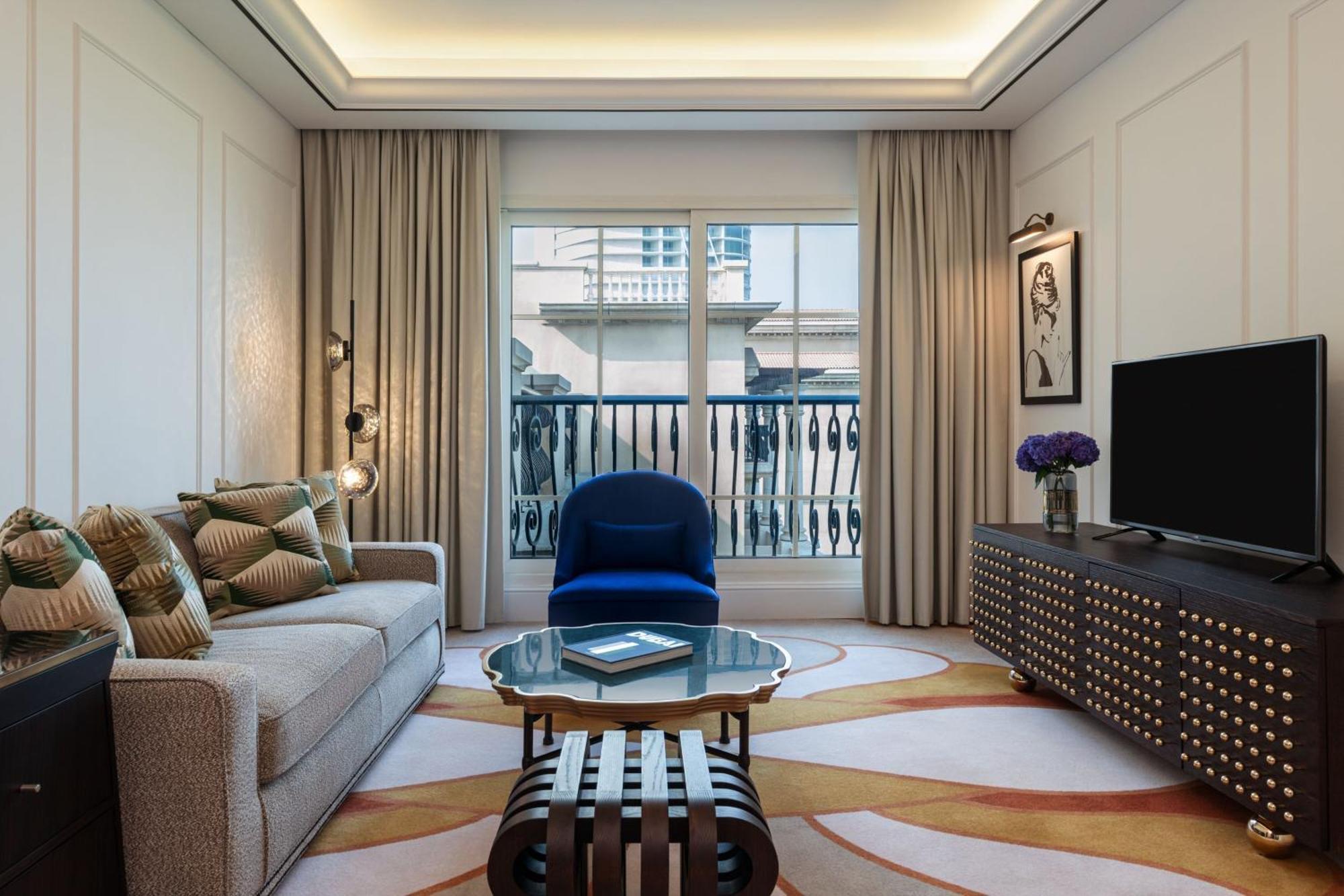 Deluxe Suite Sea View 1 King bed Balcony separate living room Sofa bed Dubai Airport Transfers & Jungle Bay Waterpark access