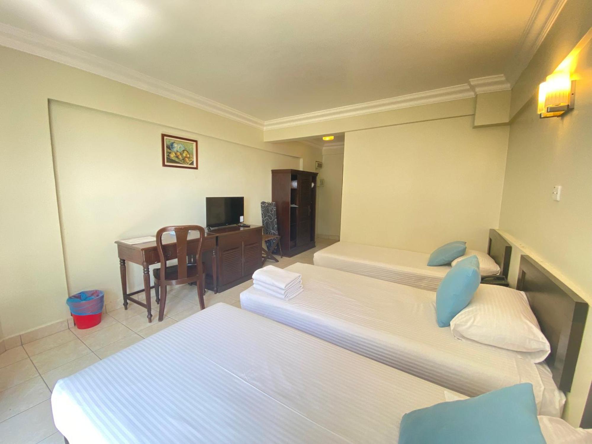 Bilik Deluxe Triple dengan Pemandangan Laut