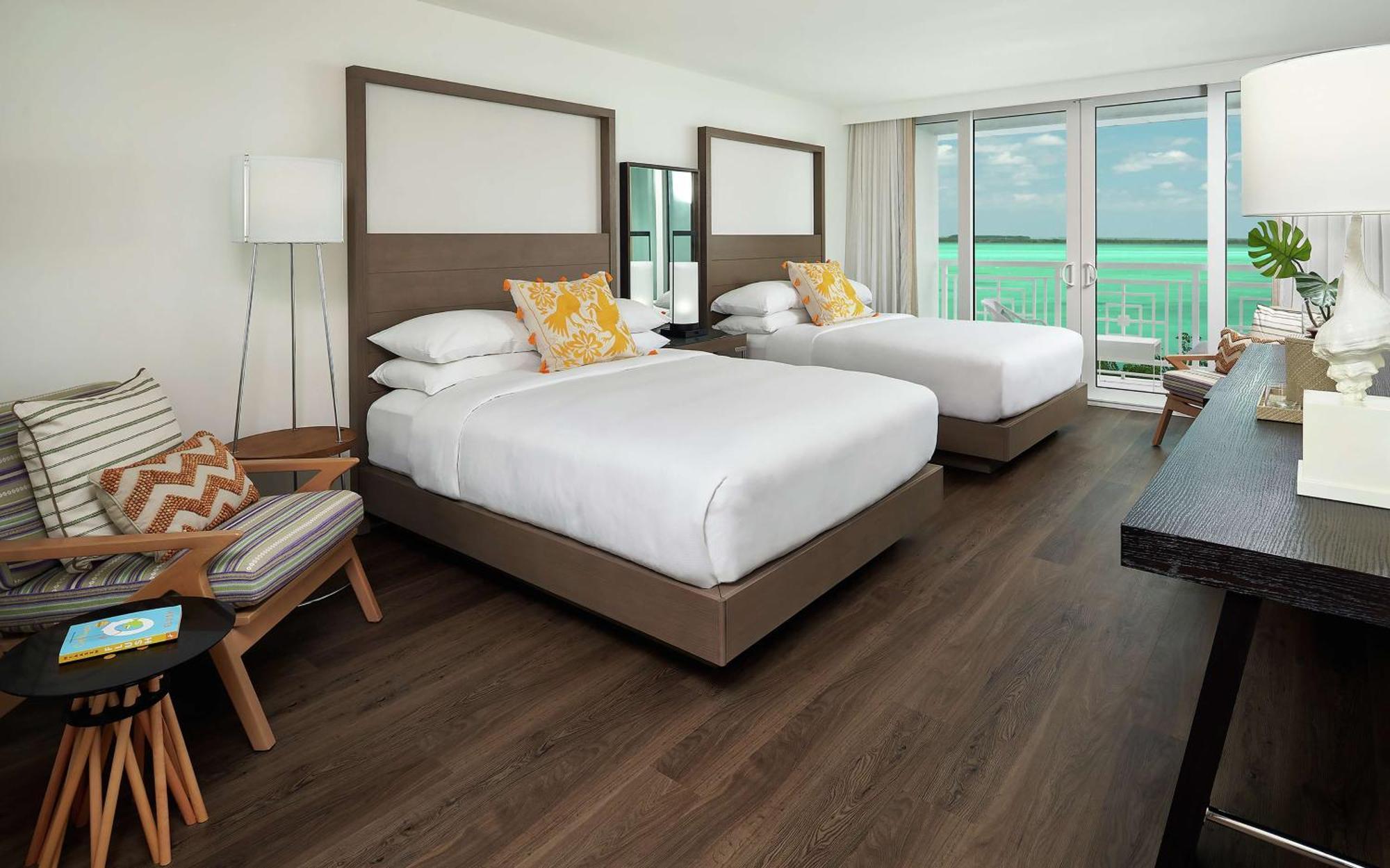 Queen Room with Two Queen Beds and Coconut Waterfront View