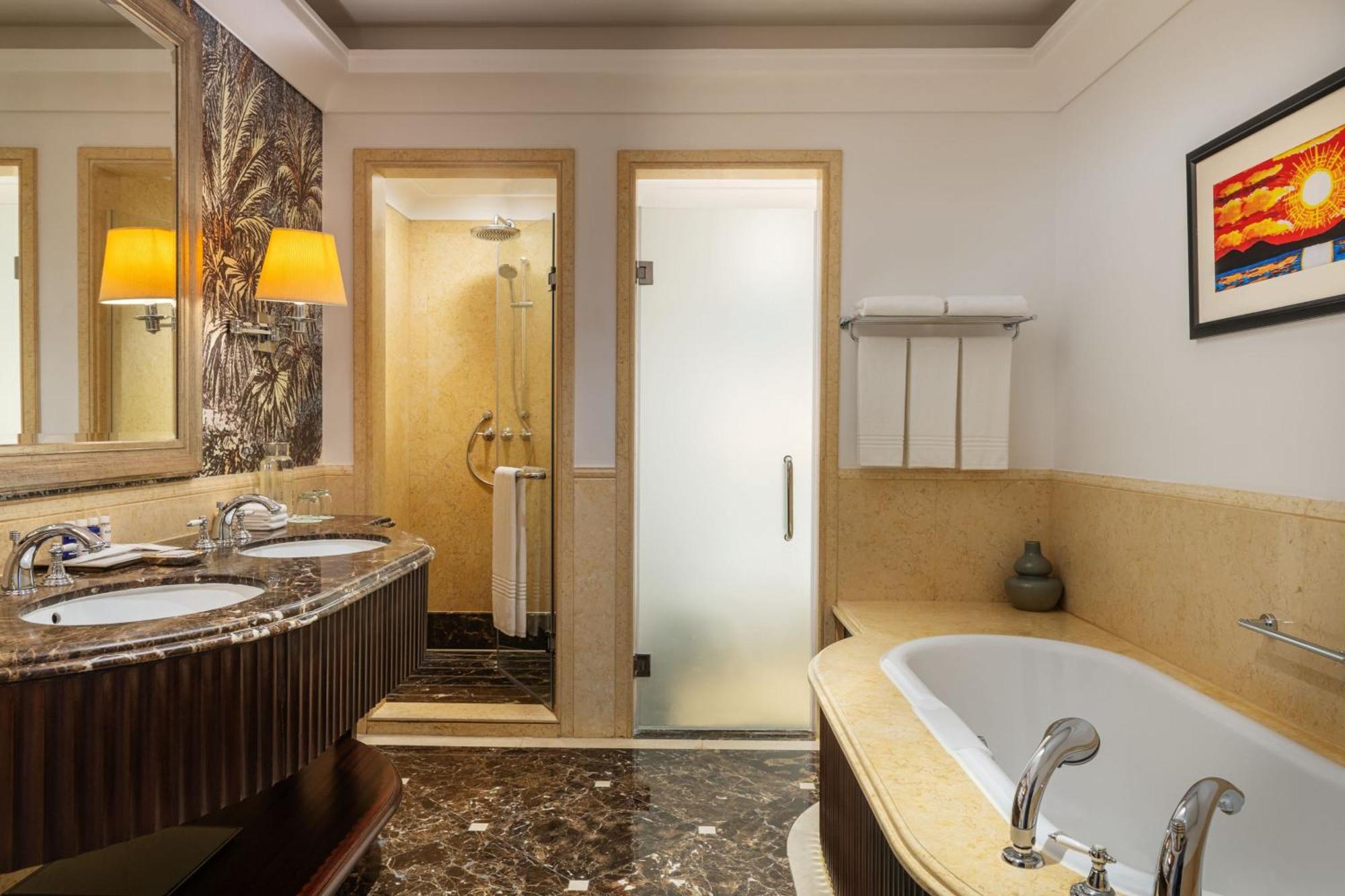Deluxe Suite Sea View 1 King bed Balcony separate living room Sofa bed Dubai Airport Transfers & Jungle Bay Waterpark access