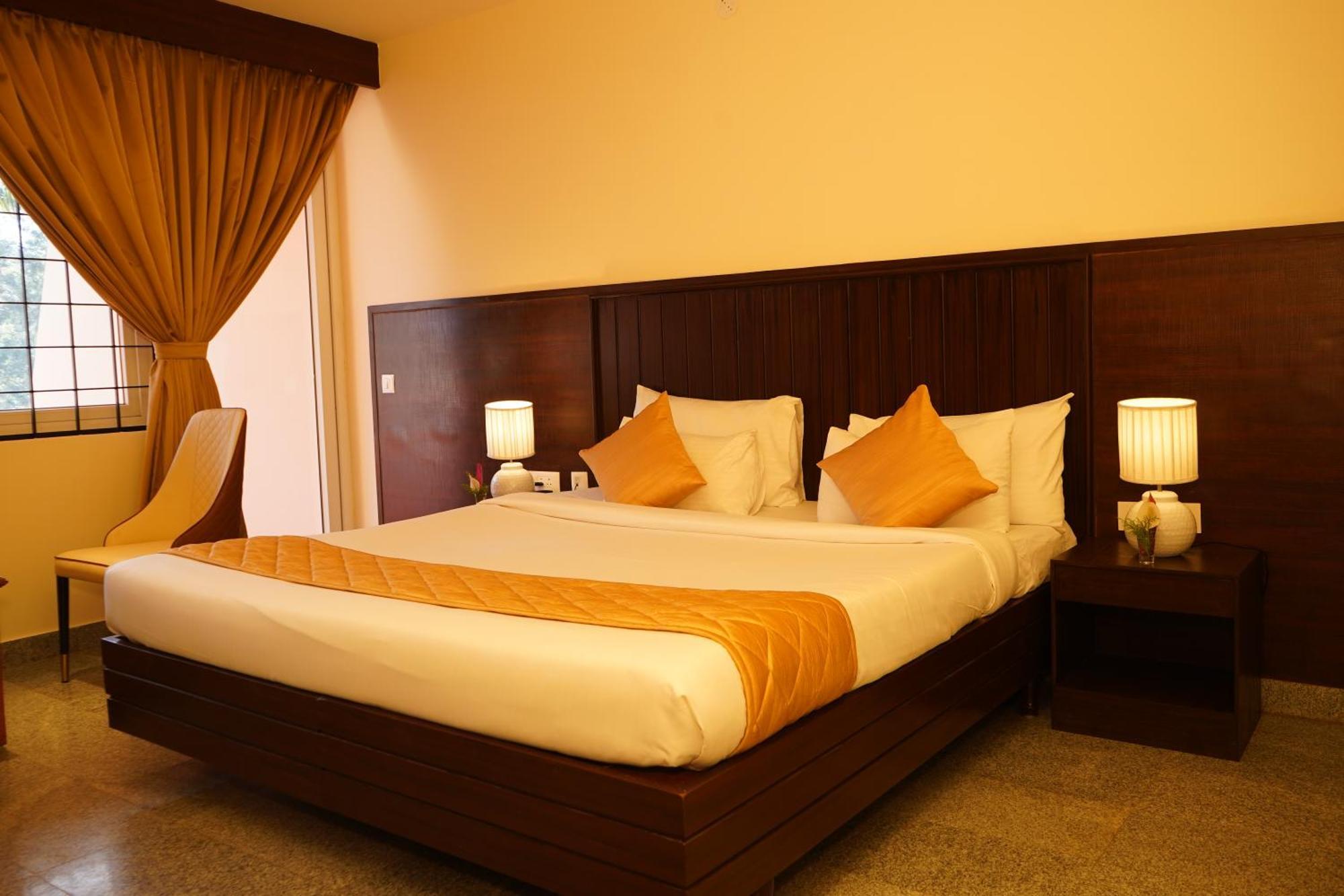 Dahlia Room (15% off on session of couple's Spa + Complimentary Welcome Drink on arrival + 15% off on session of Massage + 15% off on Jungle Safari + Free Breakfast)