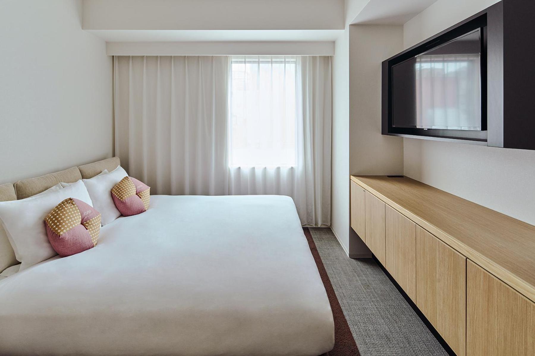 Zimmer mit Queensize-Bett