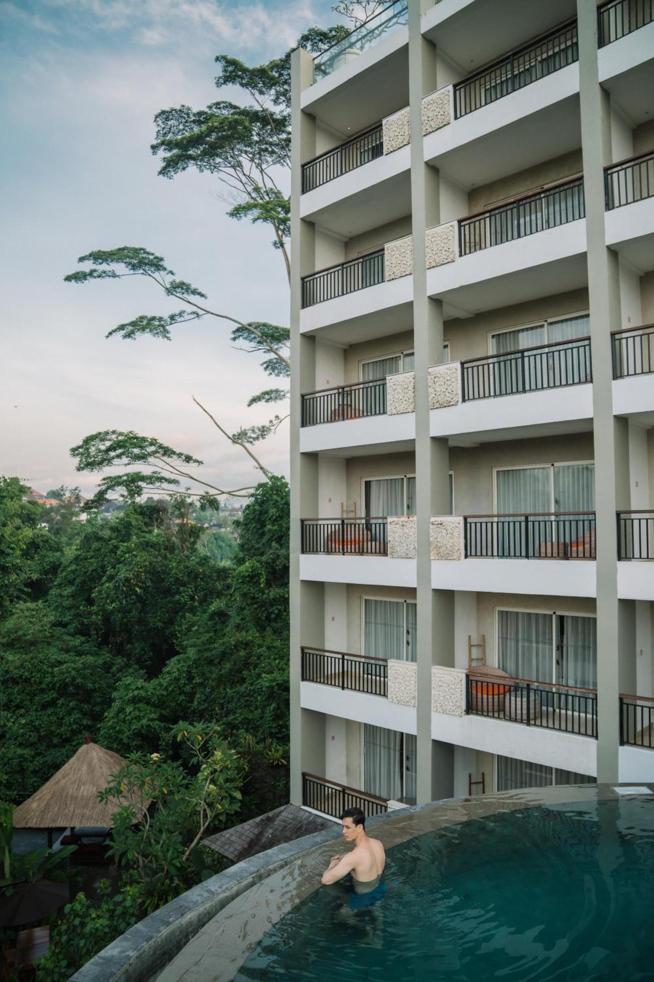 Deluxe Twin Balcony Room River View daily shuttle to Ubud City Photo Session Art Gallery Visit 24-hour access to Fitness Center Welcome Drink Kids Activities