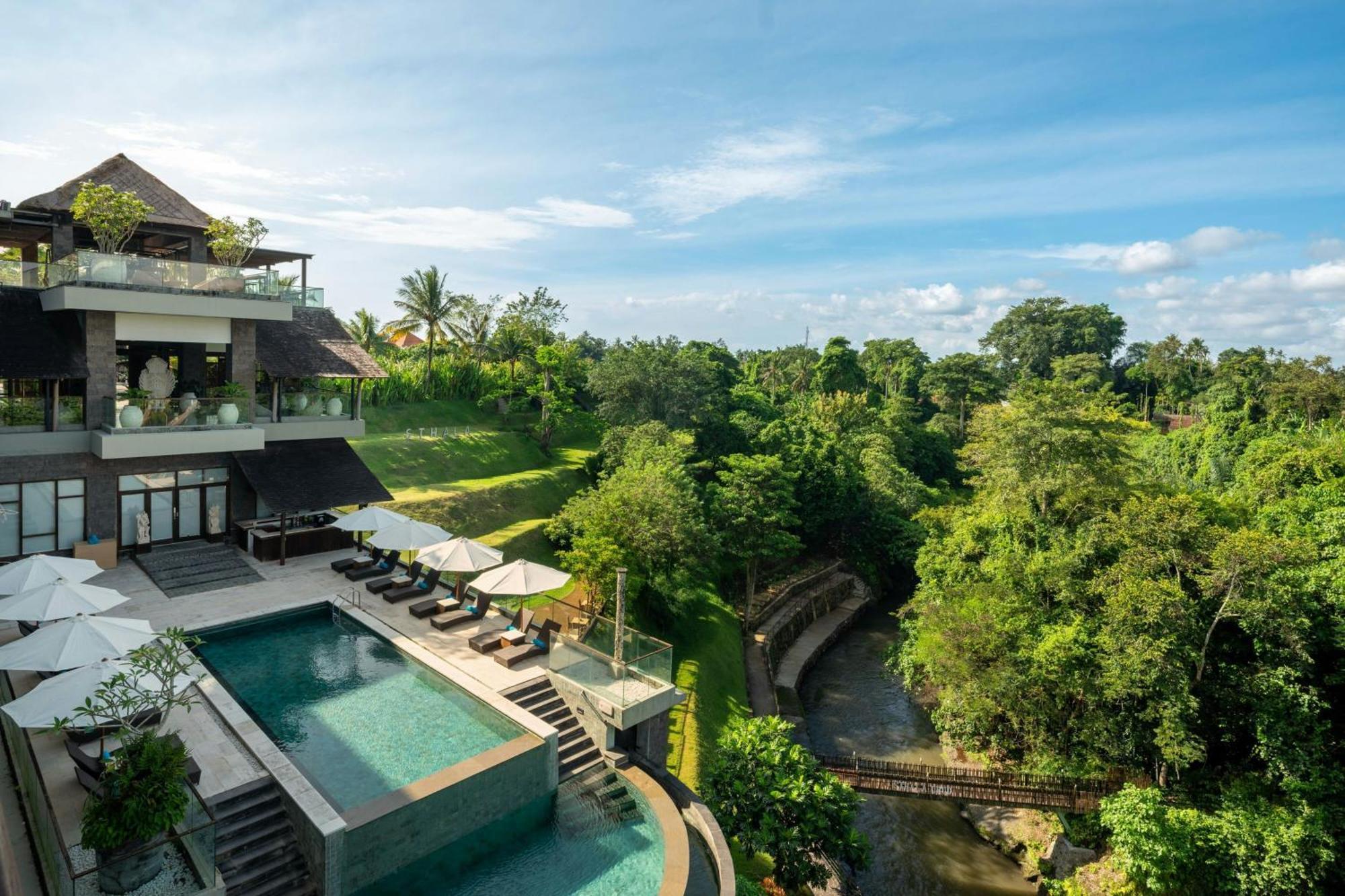 Deluxe Twin Balcony Room River View daily shuttle to Ubud City Photo Session Art Gallery Visit 24-hour access to Fitness Center Welcome Drink Kids Activities