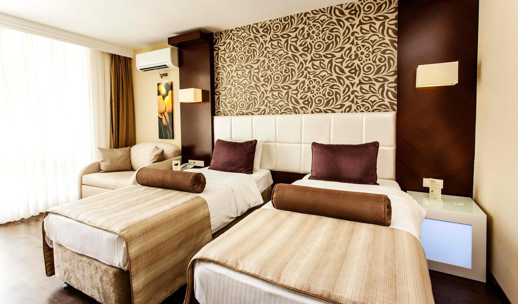 Deluxe Çift Kişilik Oda - Bahçe Manzaralı + 2 Çocuklu