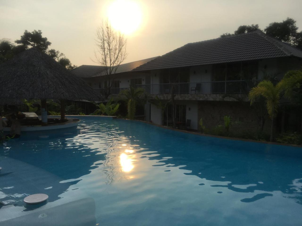 Family Suite with Balcony and Pool View